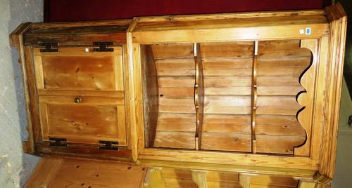 A 19th century barrel back corner cabinet.