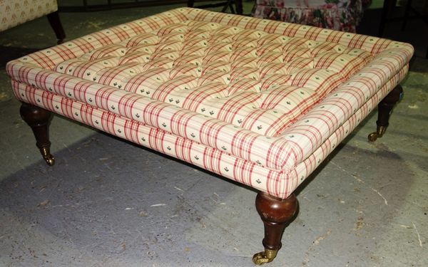 A 20th century square stool with button upholstery.