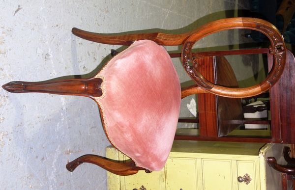 A set of four Victorian walnut balloon back chairs.