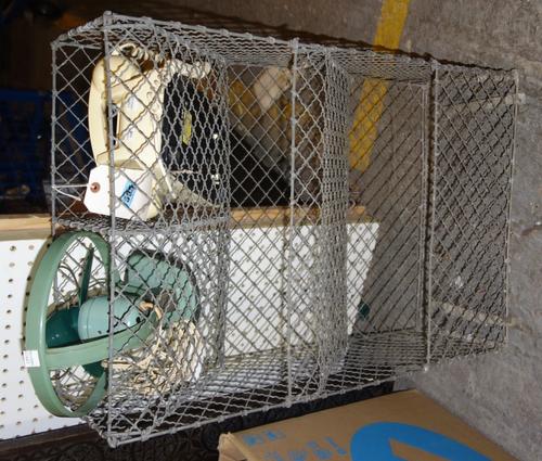 A 20th century three tier wire work rack, a vintage fan and a vintage telephone. (3)