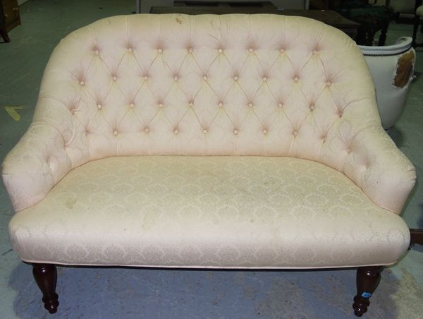 A 19th century mahogany framed button seated small sofa.