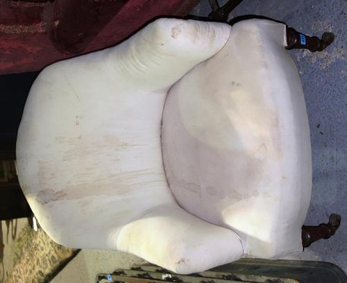 A Victorian mahogany framed button back tub chair.