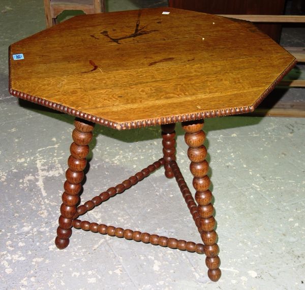 An oak bobbin turned octagonal table.