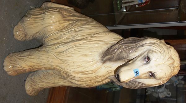 A life sized pottery Afghan hound, 84cm high.