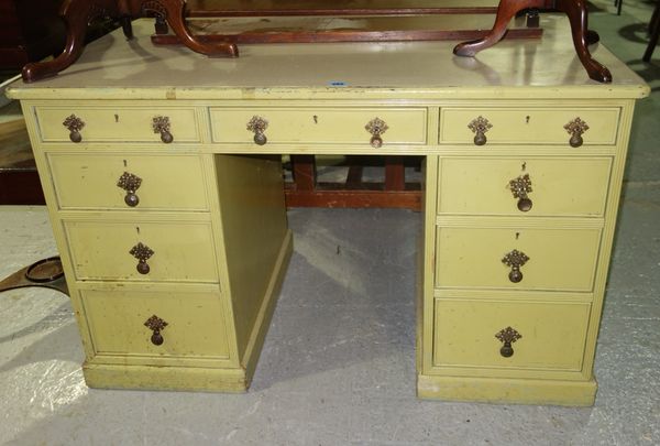 A Victorian yellow painted kneehole desk, 122cm wide x 77cm high.