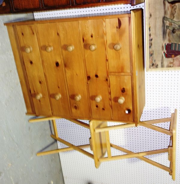 A 20th century pine chest and two modern folding tables, (3).