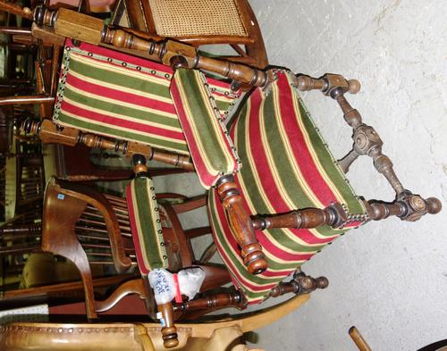 A 19th century walnut and ebonised open armchair.