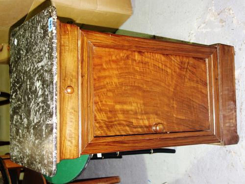 A 19th century mahogany and marble top pot cupboard.
