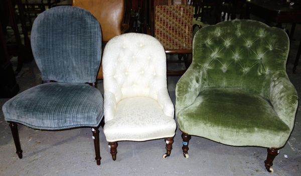 A green upholstered button back armchair, a blue upholstered fauteuil and a cream upholstered nursing chair, (3).