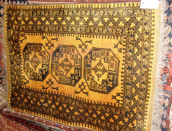 A small gold and blue ground Afghan rug, 147cm x 106cm.