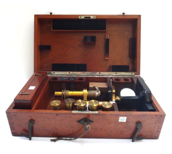 A Carl Zeiss Jena monocular microscope, late 19th century No 1186, gilt and ebonised brass, with five objectives and related accessories in a fitted m