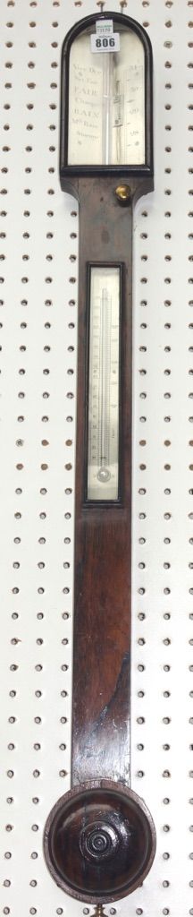 A 19th century rosewood stick barometer with silvered plain plate over a thermometer and circular half block cistern, 92cm long.
