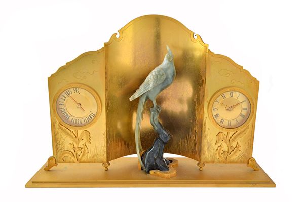 A French Art Deco gilt bronze mantel clock compendium, circa 1930, probably manufactured by ' Hour Lavigne Paris', centred with a green hardstone mode
