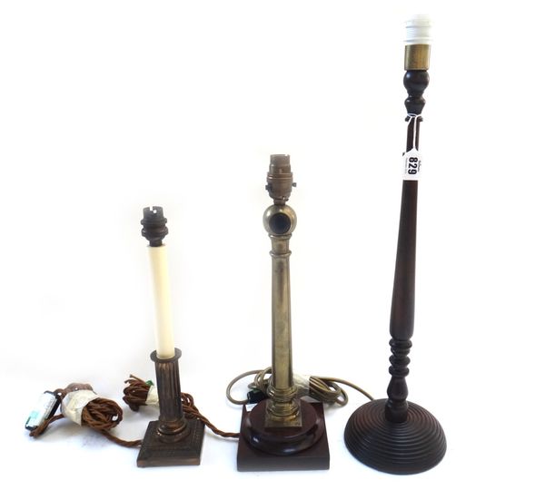 A pair of Georgian style turned mahogany candlesticks (50cm high), a pair of brass candlesticks on mahogany bases and a further pair of Corinthian col