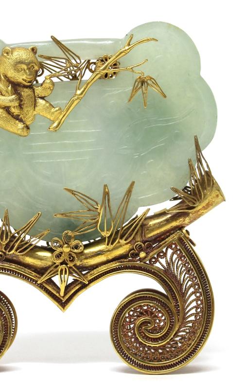 A Chinese carved lapis model of a water buffalo on an alabaster plinth, 14cm wide, a Chinese rose quartz model of a cat, and a Chinese bronze censer w