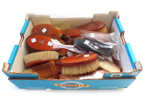 A quantity of 19th century blonde tortoiseshell backed dressing table wares including clothes and hair brushes, together with a 19th century tortoises