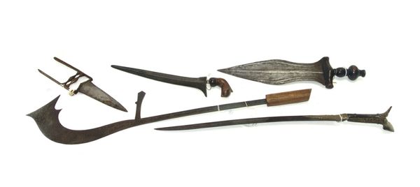 A Sumatran sekin with slightly curved steel blade, 55cm, a Javanese kris with one piece carved wooden handle, an Indian all-steel katar dagger, 42cm l