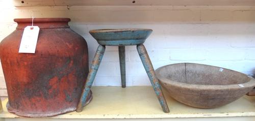 A 19th century terracotta rhubarb forcer of circular tapering form 39cm high, a blue painted jointed stool and a sycamore bowl 47cm diameter. (3).