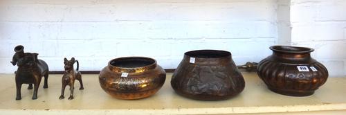 A 19th century Middle Eastern brass and copper inlaid bowl 22cm diameter; another Middle Eastern bronzed bowl of 'lobed' section 22cm diameter, a copp