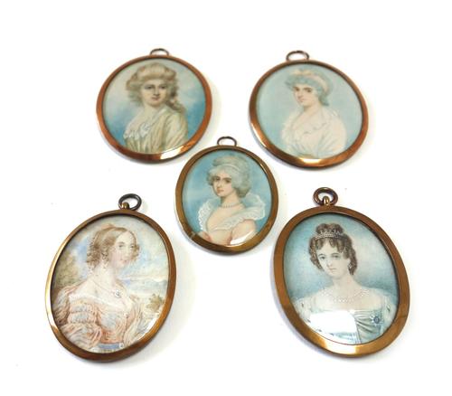 A late 19th/early 20th century Continental portrait miniature on ivory of a fashionable woman in 18th century style dress, 8cm high, and four others s