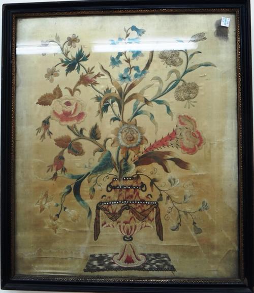 A Shirvan rug, Caucasian, the indigo field with four spiked diamonds and pairs of leaves, an outer line of rosettes, an ivory bird border, 172cm x 142
