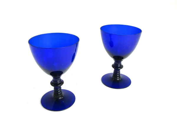 A quantity of `Bristol' blue glasswares, including; a facet cut circular bowl with square foot (21cm dia), ten goblets with knopped stems (14.2cm high