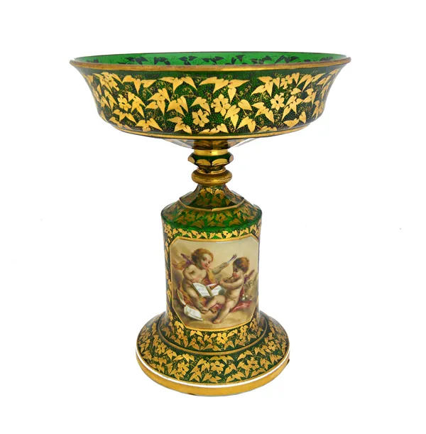 A Bohemian green glass and gilt foliate decorated comport, 19th century, with enamel cartouche to the stem, painted with putti playing musical instrum