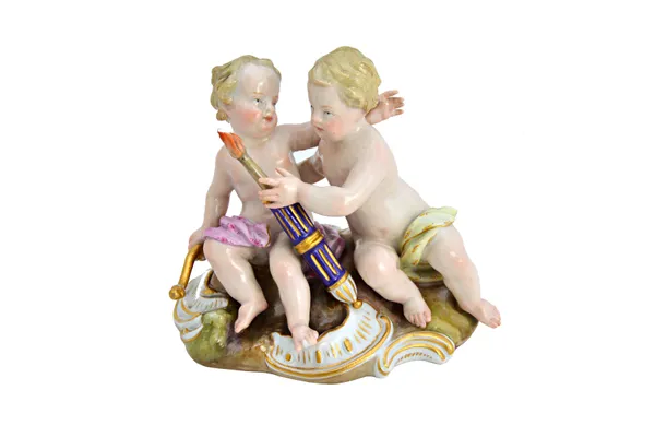 A Meissen porcelain figure group, 19th century, depicting Cupid and putto with a bow and quiver of arrows, on a gilt C scroll base, blue crossed sword