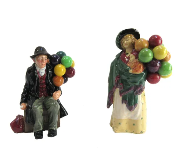 A Royal Doulton figure, 'The Balloon Seller HN583', and one other Royal Doulton figure 'The Balloon Man HN1954' (2).
