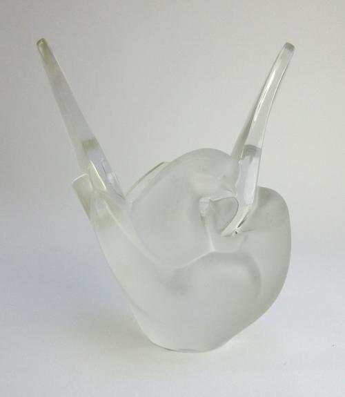 A Lalique 'Sylvie' clear and frosted glass vase modelled as two intertwined doves with internal frog, etched 'Lalique France', 21cm high.