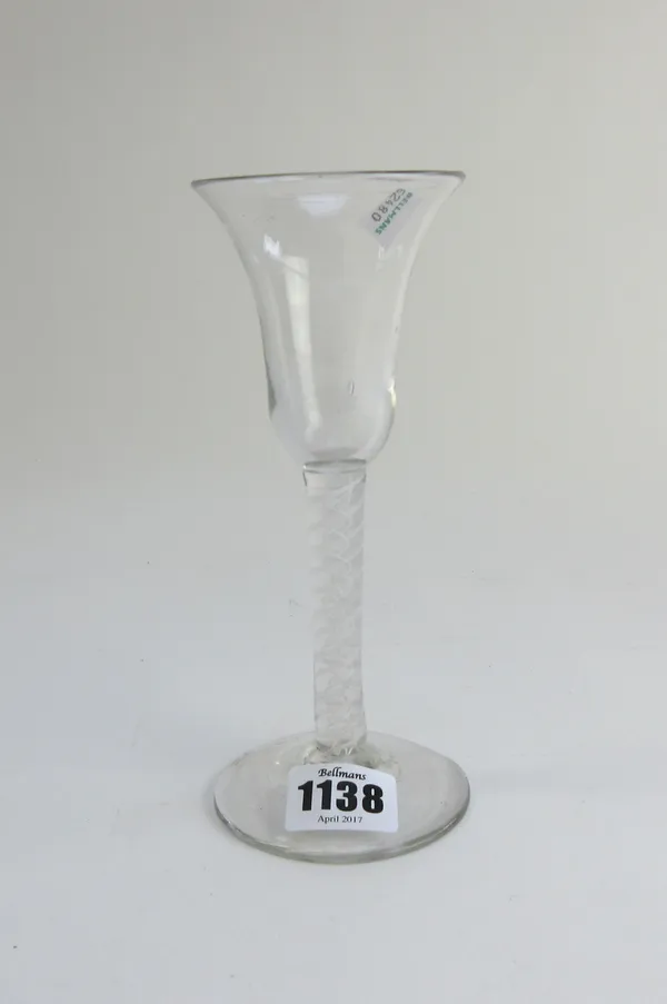 An opaque twist wine glass, circa 1765, the bell bowl raised on a double series opaque twist stem and plain foot, 17.75cm. high.