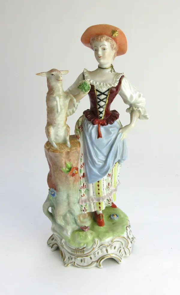 A pair of Dresden porcelain figures, 20th century, modelled as a shepherd and shepherdess on gilt C scroll bases, 21.5cm high, a pair of Dresden porce