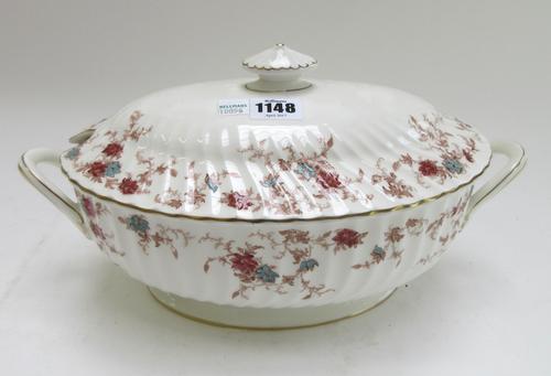 An extensive Minton part dinner, tea and coffee service decorated in the 'Ancestral' pattern, comprising; a footed two handled tureen and cover (35cm