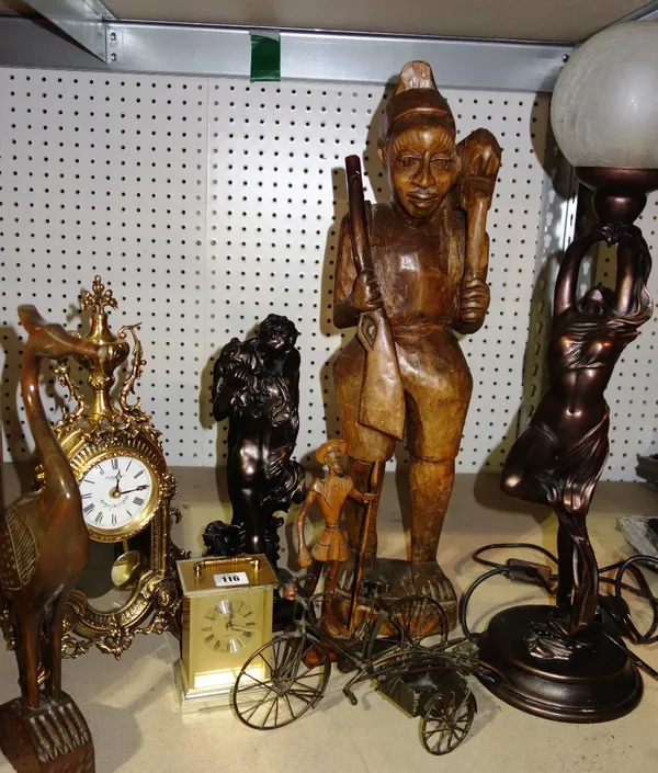 A group of collectables including carved wooden figures, two gilt metal clocks and sundry, (qty)SH2.