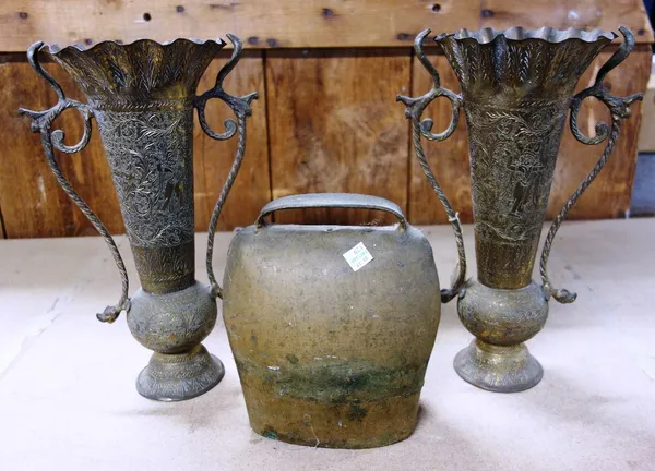 A large quantity of assorted metalware to include; Indian and European brass bells, vases, lanterns, jam pans, trays, cast iron knockers, copper trive