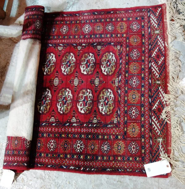 An Indian Bokhara rug, with two columns of ten guls, 167cm x 97cm. F6