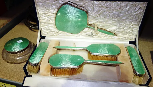 A silver and green enamel dressing table set and a quantity of silver plate.  SH9