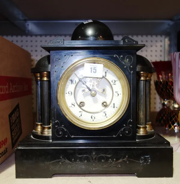 An early 20th century slate cased eight day mantel clock.   SH12