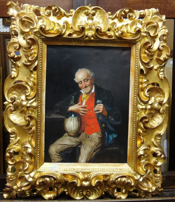 W. Busciolani (19th/20th century), Old man drinking, oil on canvas, signed and dated 1906, 33cm x 23.5cm.; in a pierced and carved Florentine giltwood