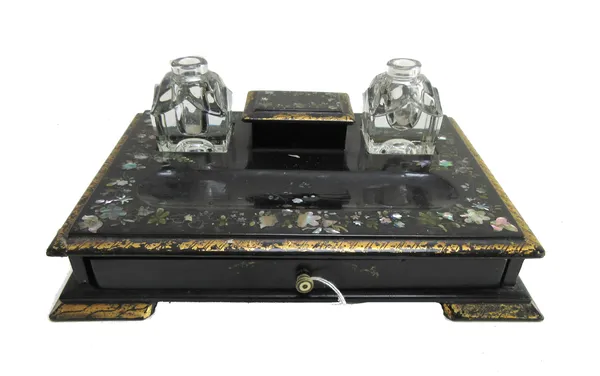 A Victorian mother-of-pearl inlaid black lacquer papier mache single drawer desk stand, with a pair of inkwells, 27cm wide x 20cm deep.