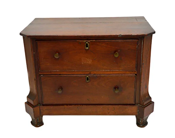 A diminutive early 19th century Dutch mahogany two drawer commode, on tapering square supports, 42cm wide x 26cm deep.   Illustrated