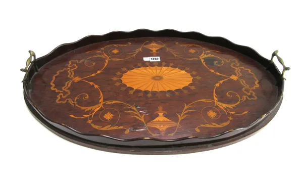 An Edwardian marquetry inlaid oval serving tray with wavy gallery, 69cm wide x 45cm high.