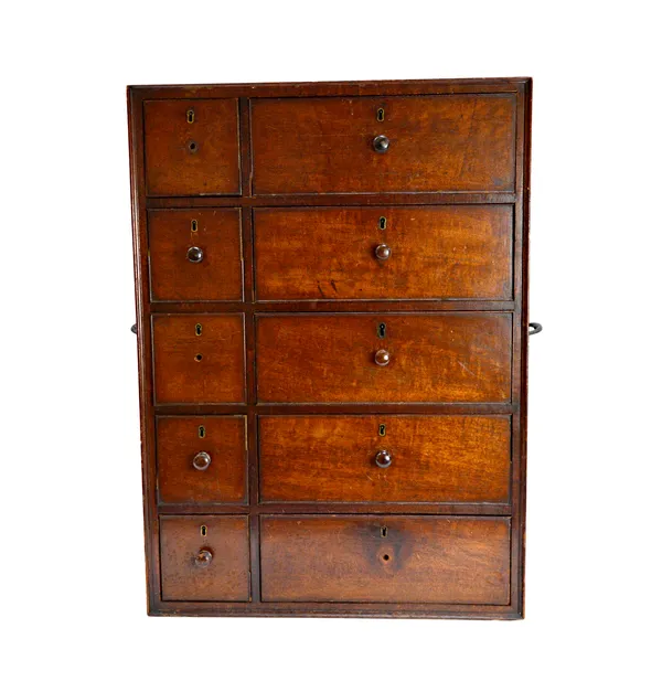 An early 19th century mahogany table top collector's chest, with five short and five long drawers, 50cm wide x 65cm high.  Illustrated