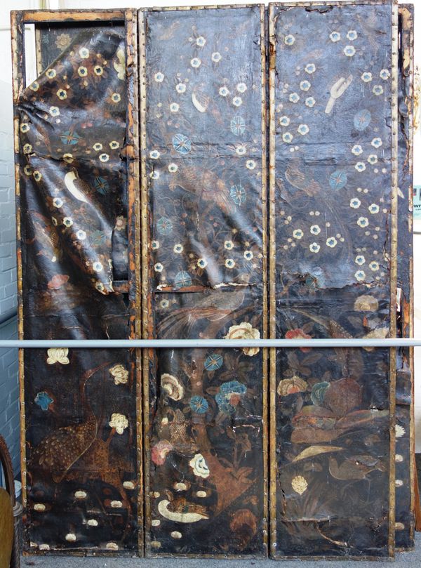 A large 18th century leather six fold screen painted with exotic birds amongst foliage (a.f, all pieces present), 340cm wide x 243cm high.