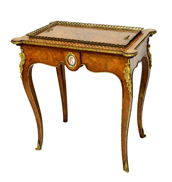 A Victorian gilt metal mounted marquetry and ceramic inlaid rectangular jardiniere, on cabriole supports, 76cm wide x 50cm deep.   Illustrated