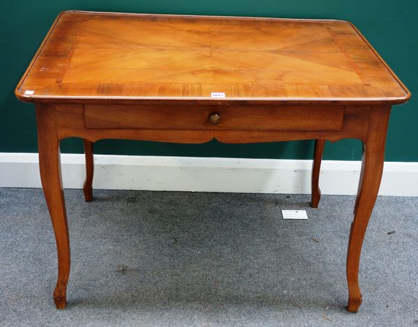 A 19th century French crossbanded walnut single drawer writing table, on cabriole supports, 95cm wide x 66cm deep.