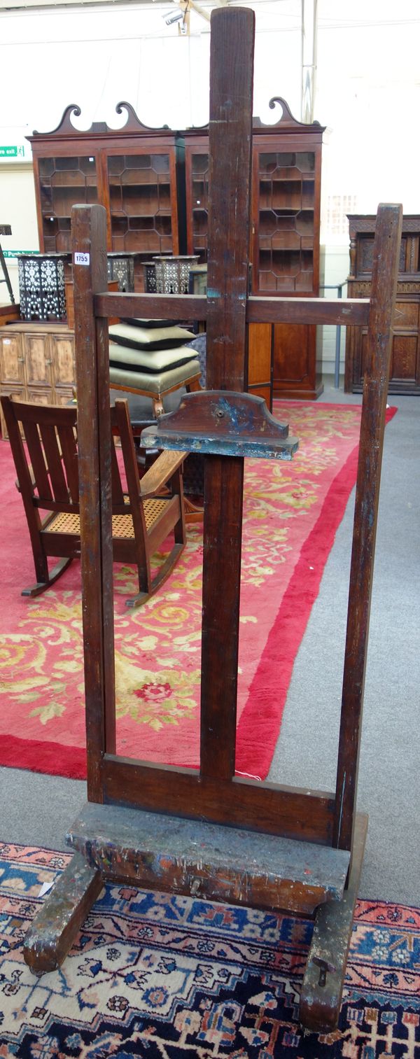 An early 20th century oak 'H' frame artist's easel, 65cm wide.