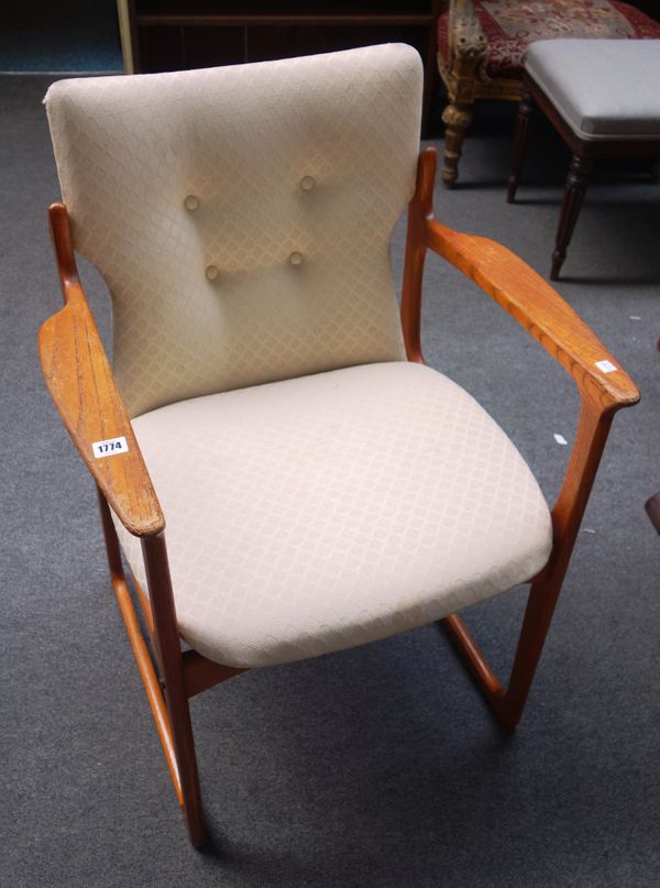 A set of six mid-20th century teak framed dining chairs, to include a pair of carvers (6).