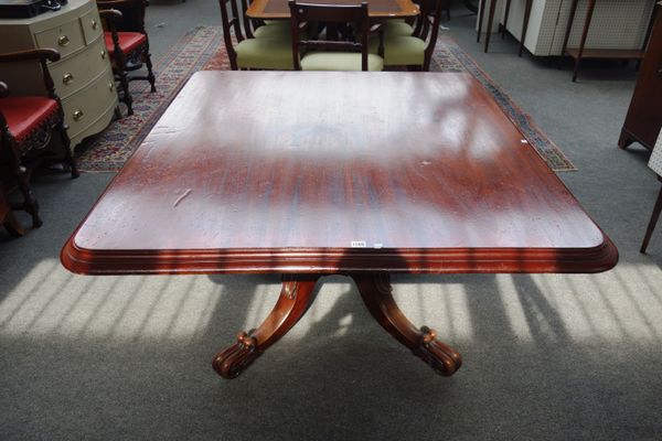 An early Victorian mahogany rectangular snap top breakfast table, on four downswept supports, 125cm x 141cm.