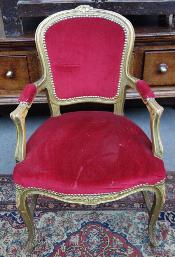 Peter Stringfellow's, Angels Club; a set of eight Louis XV style beech frame open armchairs with red upholstery, each 60cm wide x 97cm high. Sold with